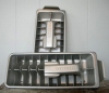 Metal ice cube trays with levers